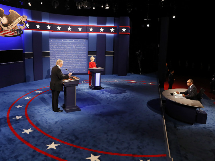 Republican presidential nominee Donald Trump speaks on stage with Democratic presidential nominee Hillary Clinton during the presidential debate at Hofstra University in Hempstead, N.Y., Monday, Sept. 26, 2016.